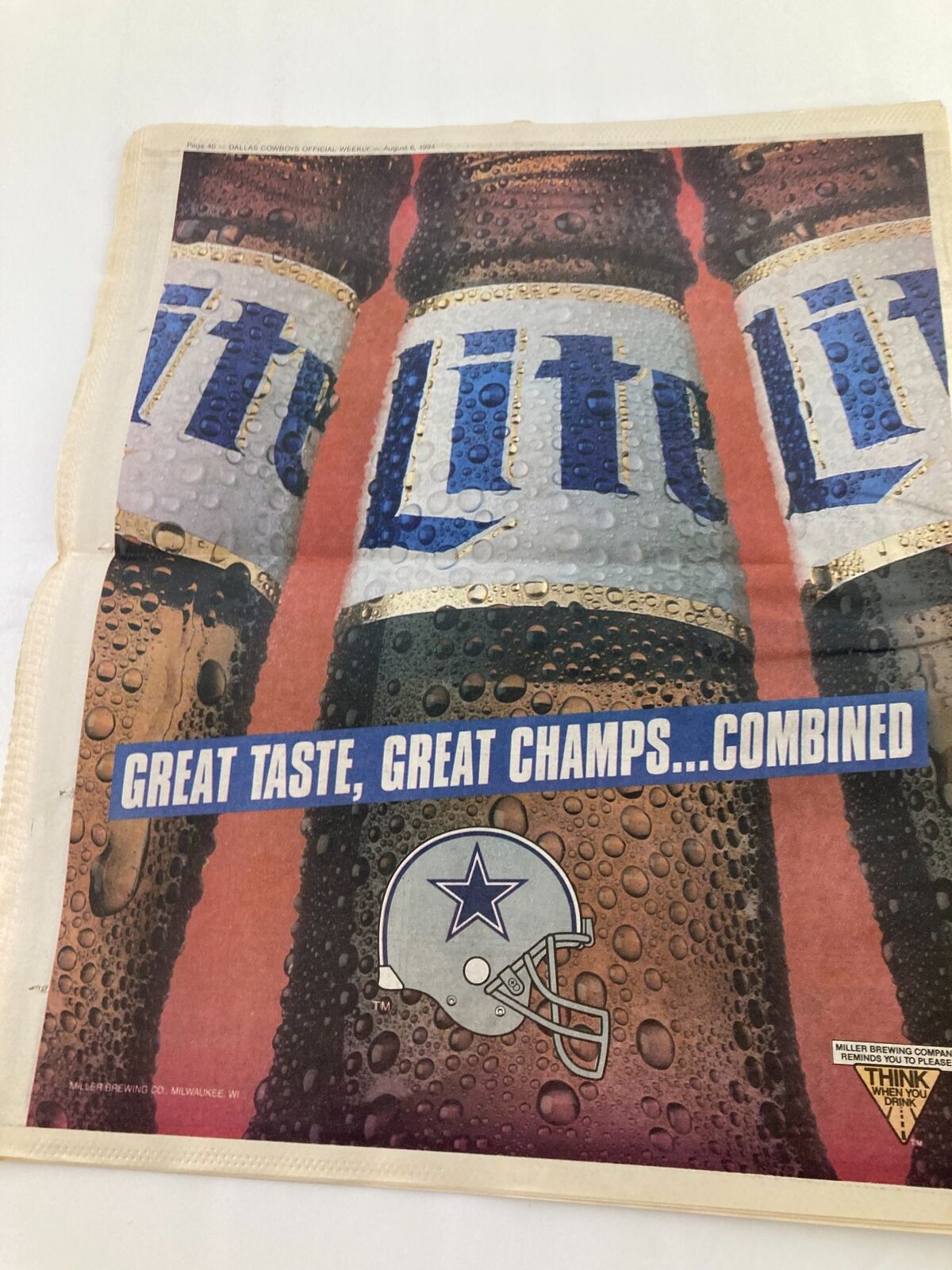 Dallas Cowboys Weekly Newspaper August 6 1994 Vol 20 #8 James Washington featuring an advertisement with the slogan 'Great Taste, Great Champs... Combined' alongside beer branding and a Dallas Cowboys logo.