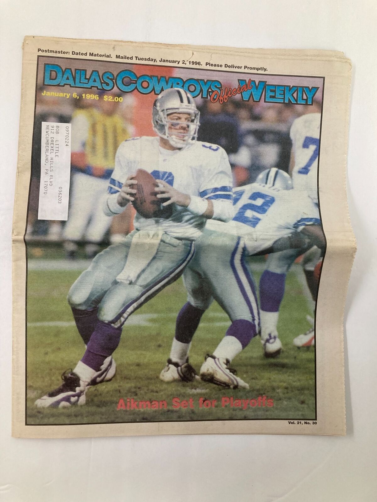 Cover of the Dallas Cowboys Weekly Newspaper dated January 6, 1996, featuring Troy Aikman, showcasing the headline 'Aikman Set for Playoffs'. The newspaper is noted as in good condition with minor wear, and comes folded.