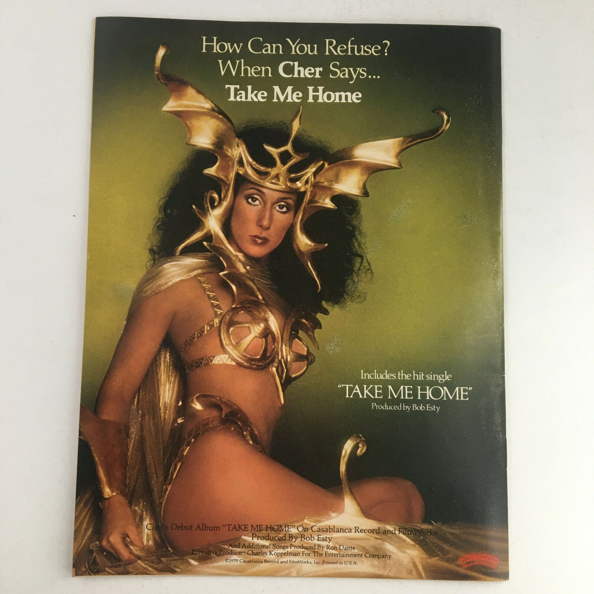 Circus Magazine from March 13, 1979, featuring a bold advertisement for Cher's song 'Take Me Home.' The image displays Cher dressed in a striking costume, emphasizing her iconic style during the late 1970s.