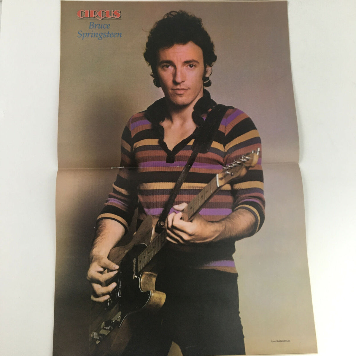 Interior poster from Circus Magazine December 31 1980 showcasing Bruce Springsteen with his guitar.