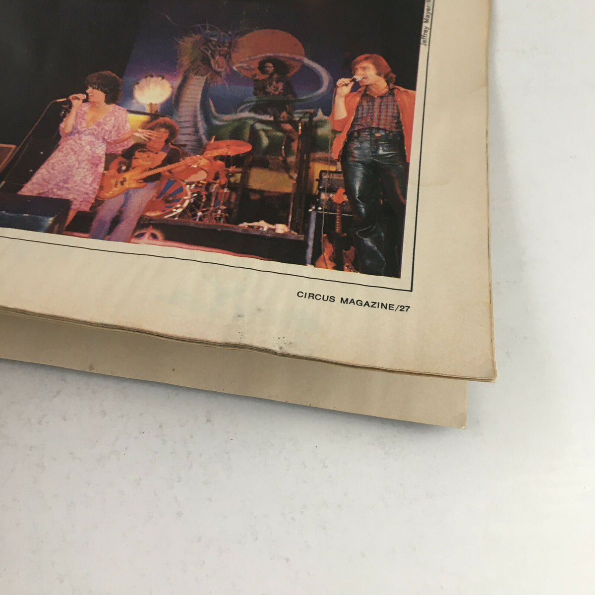 Image showing a performance scene from Circus Magazine April 27, 1978, highlighting a live band with musicians in a concert setting.