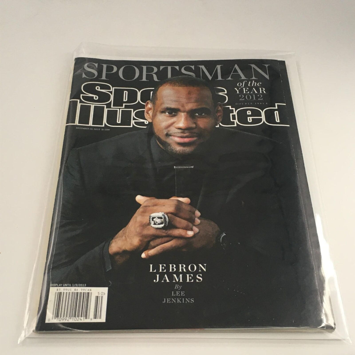 Cover of Sports Illustrated Magazine December 10, 2012, featuring LeBron James as Sportsman of the Year, with a portrait of him wearing a black suit and ring, in vintage magazine condition.