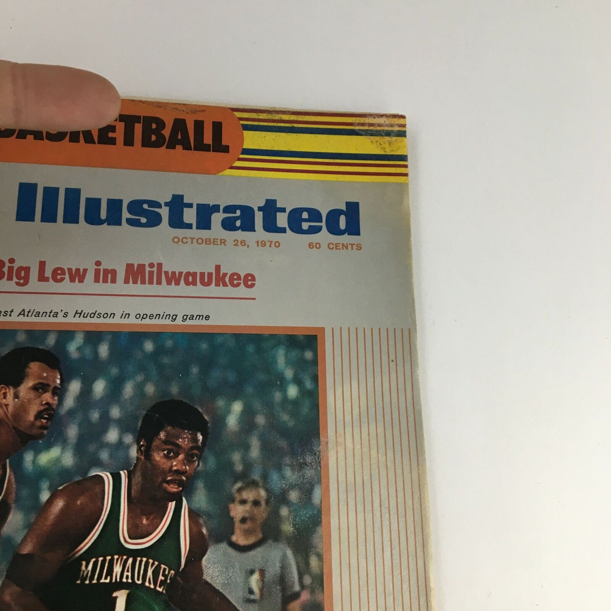 Close-up of the Sports Illustrated Magazine cover from October 26 1970, highlighting the cover title with Oscar Robertson and Lew Alcindor, a significant moment in basketball.