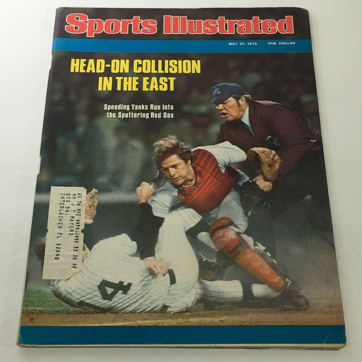 Sports Illustrated cover from May 31, 1976 titled 'Head-On Collision In The East' featuring an intense baseball scene with players colliding, showcasing the action of the Speeding Yanks against the Sputtering Red Sox.