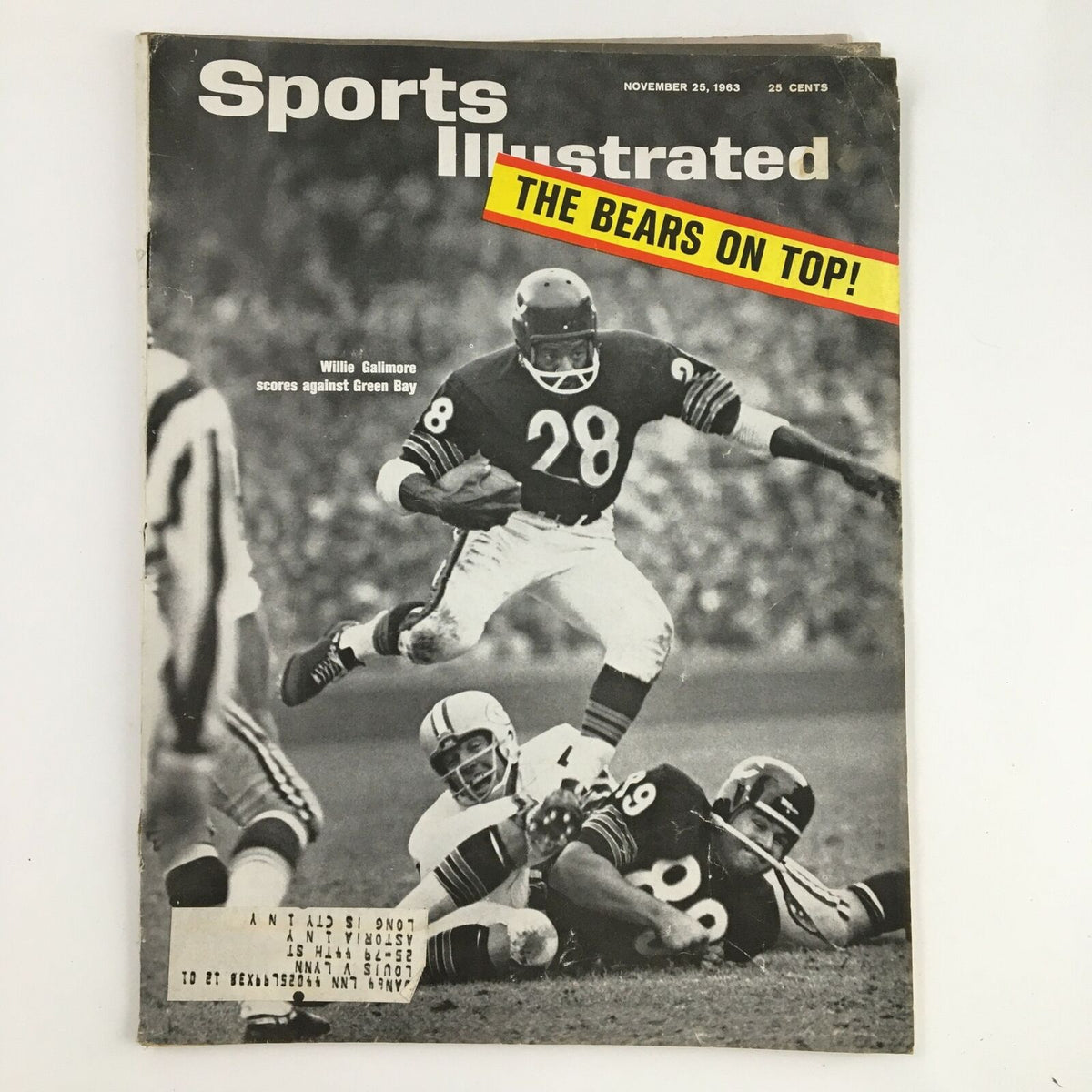 Cover of Sports Illustrated Magazine from November 25, 1963, featuring Chicago Bears' Willie Galimore, number 28, running with the football against Green Bay, showcasing vintage sports history.