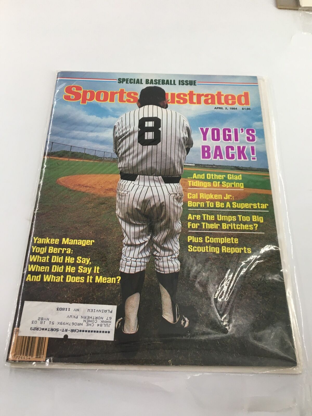 Sports Illustrated Magazine April 2 1984 featuring Yogi Berra as Yankee Manager on the cover, showcasing Berra in a vintage baseball uniform from behind next to a baseball field.
