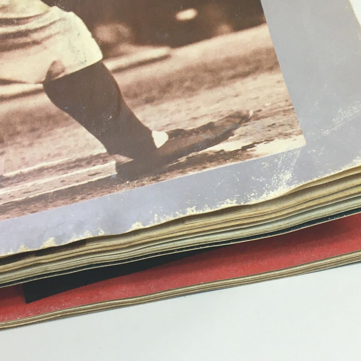 Close-up image of the edge of the vintage Sports Illustrated magazine from March 18, 1974, showcasing slight wear and history of the publication, featuring Babe Ruth Jr.