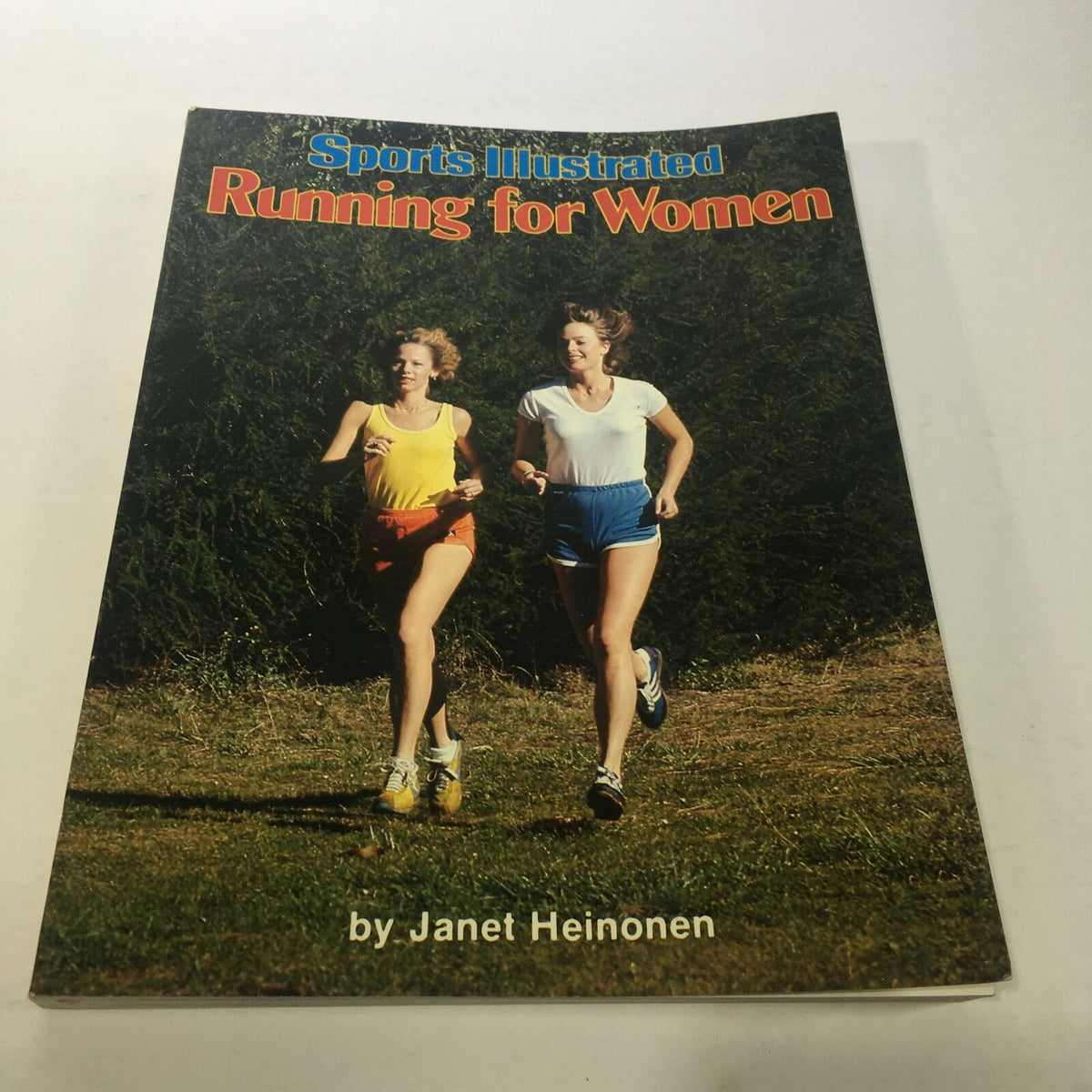 Cover of Vintage Sports Illustrated Magazine: 1979 - Running For Women by Janet Heinonen featuring two women jogging.