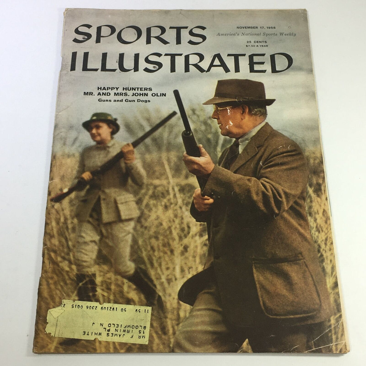 Cover of Vintage Sports Illustrated Magazine from November 17, 1958, featuring Happy Hunters Mr. and Mrs. John Olin, showcasing the sporting culture of the late 1950s.