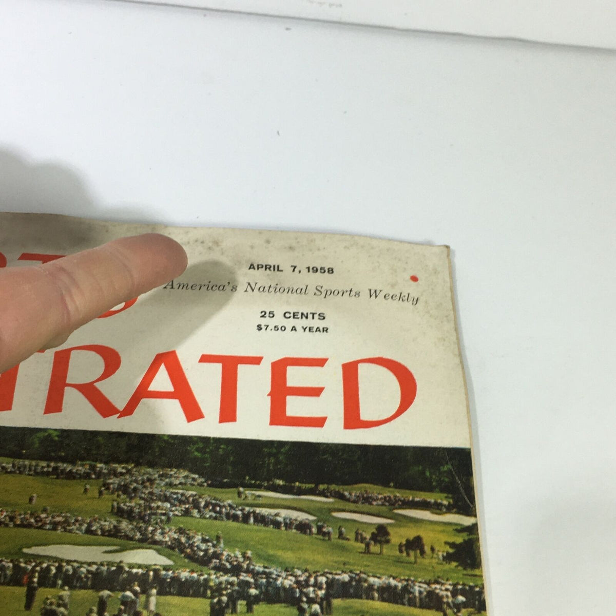 Close-up view of VTG Sports Illustrated Magazine April 7 1958, highlighting details such as the publication date, pricing, and the cover design emphasizing The Masters golf tournament.