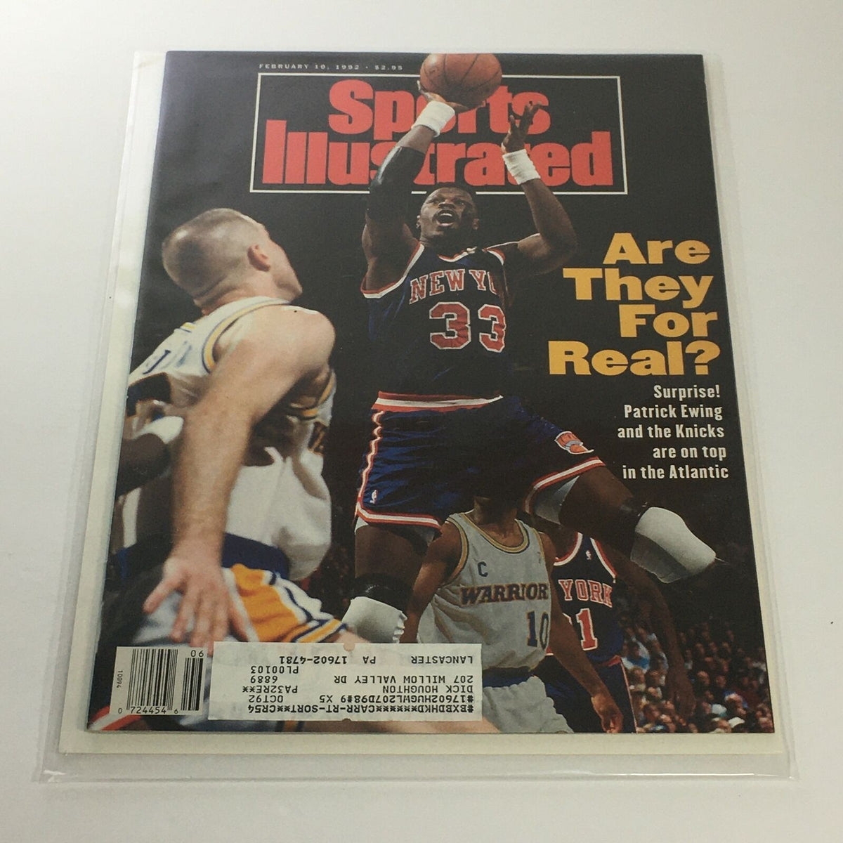 Sports Illustrated cover from February 10, 1992, featuring NBA player Patrick Ewing of the New York Knicks, showcasing a dramatic moment in a basketball game.