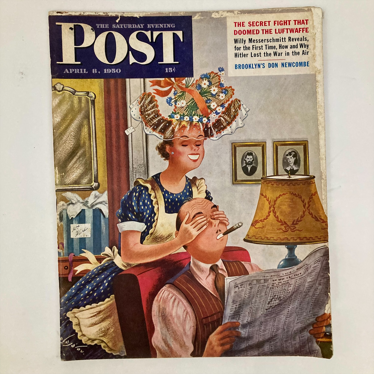 Illustrated cover of Saturday Evening Post Magazine from April 8, 1950, featuring a woman playfully covering a man's eyes while he reads a newspaper. The cover showcases vibrant and colorful artwork by Constantin Alajalov, capturing the essence of mid-20th century American culture.
