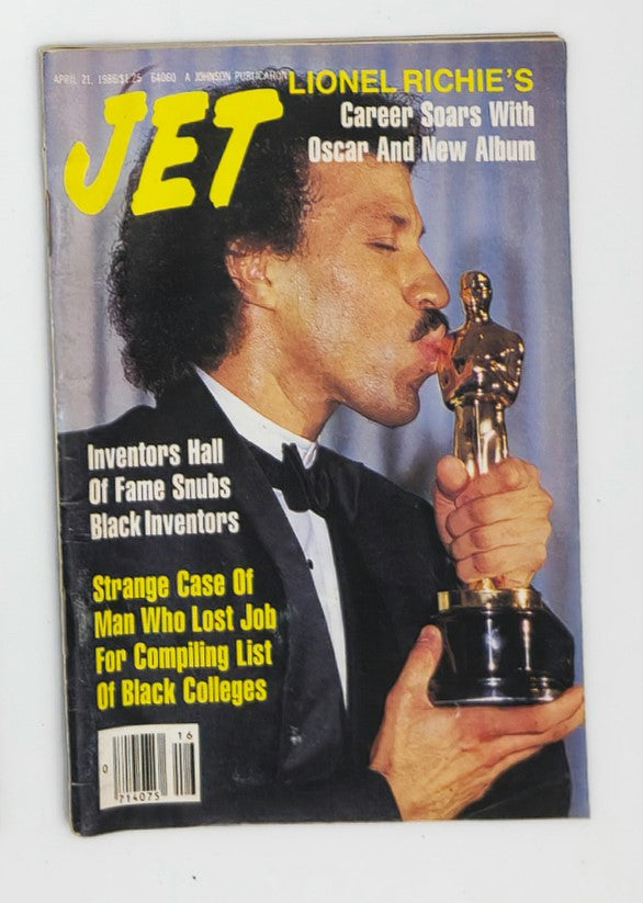 VTG Jet Magazine cover from April 21, 1986, featuring Lionel Richie celebrating his Oscar win, titled 'Lionel Richie's Career Soars with Oscar and New Album'. The cover also includes features like 'Inventors Hall of Fame Snubs Black Inventors' and 'Strange Case of Man Who Lost Job for Compiling List of Black Colleges', with a close-up image of Richie holding the Oscar.