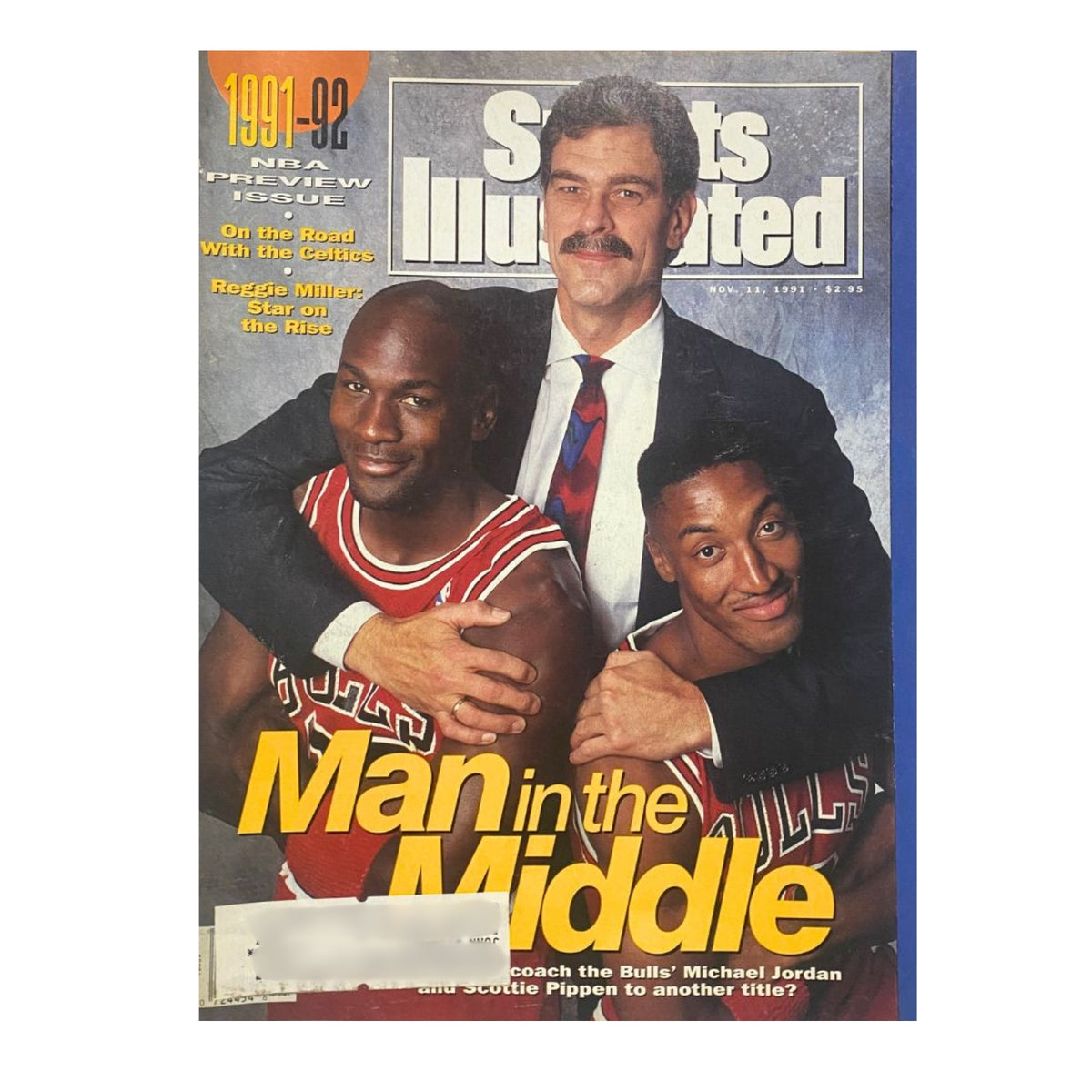 Cover of Sports Illustrated from November 11, 1991, featuring Michael Jordan and Scottie Pippen highlighted with the title 'Man in the Middle.' A key issue in the collection of six Sports Illustrated magazines focused on Michael Jordan.