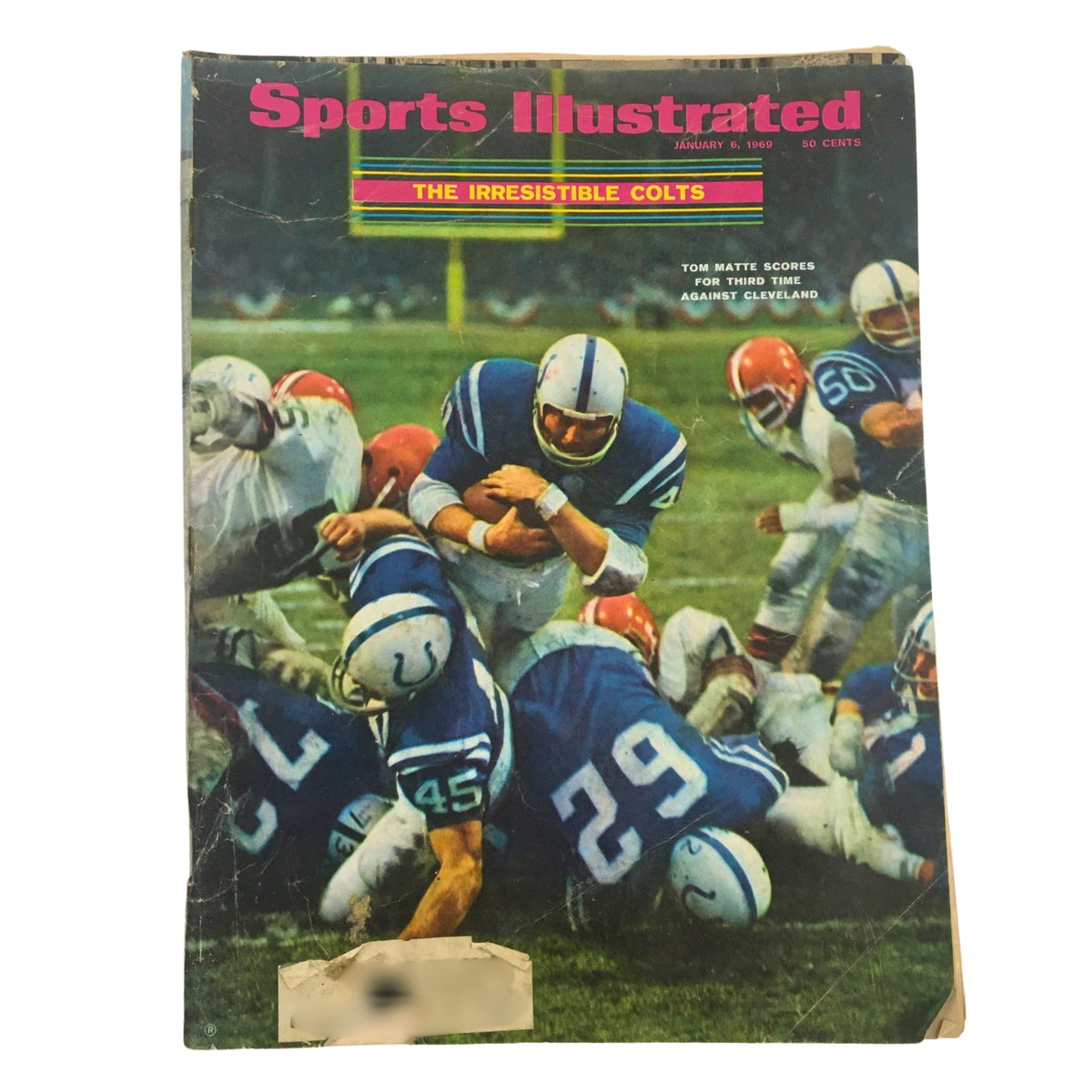 Cover of Sports Illustrated magazine from January 6, 1969, titled 'The Irresistible Colts' featuring Tom Matte scoring against Cleveland, showcasing NFL history, part of a lot of 8 1960s-1970s Sports Illustrated Magazine NFL Collections.