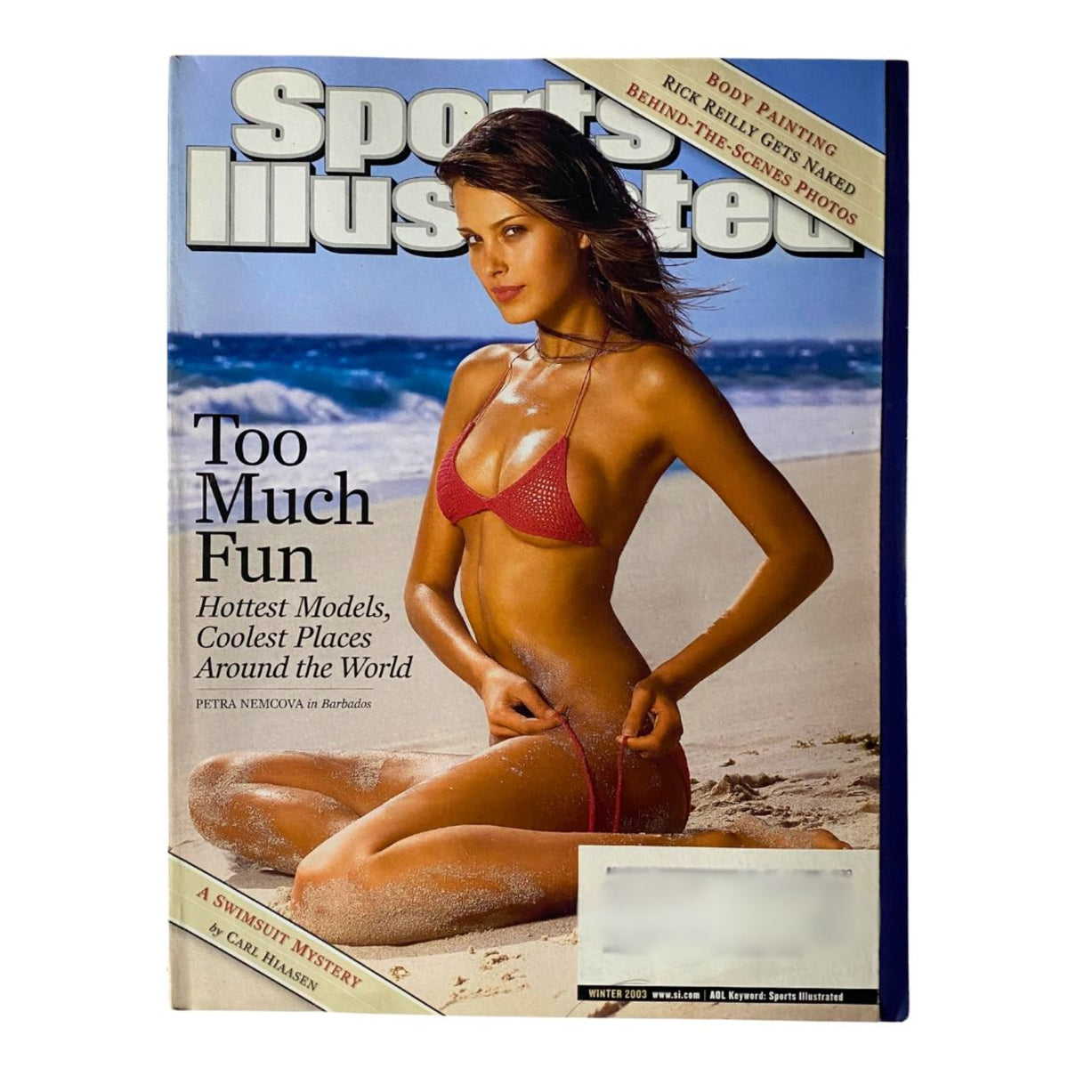 Duplicate cover of Sports Illustrated Swimsuit Edition Winter 2003 featuring model Petra Nemcova in a bikini on the beach, showcasing Caribbean allure.