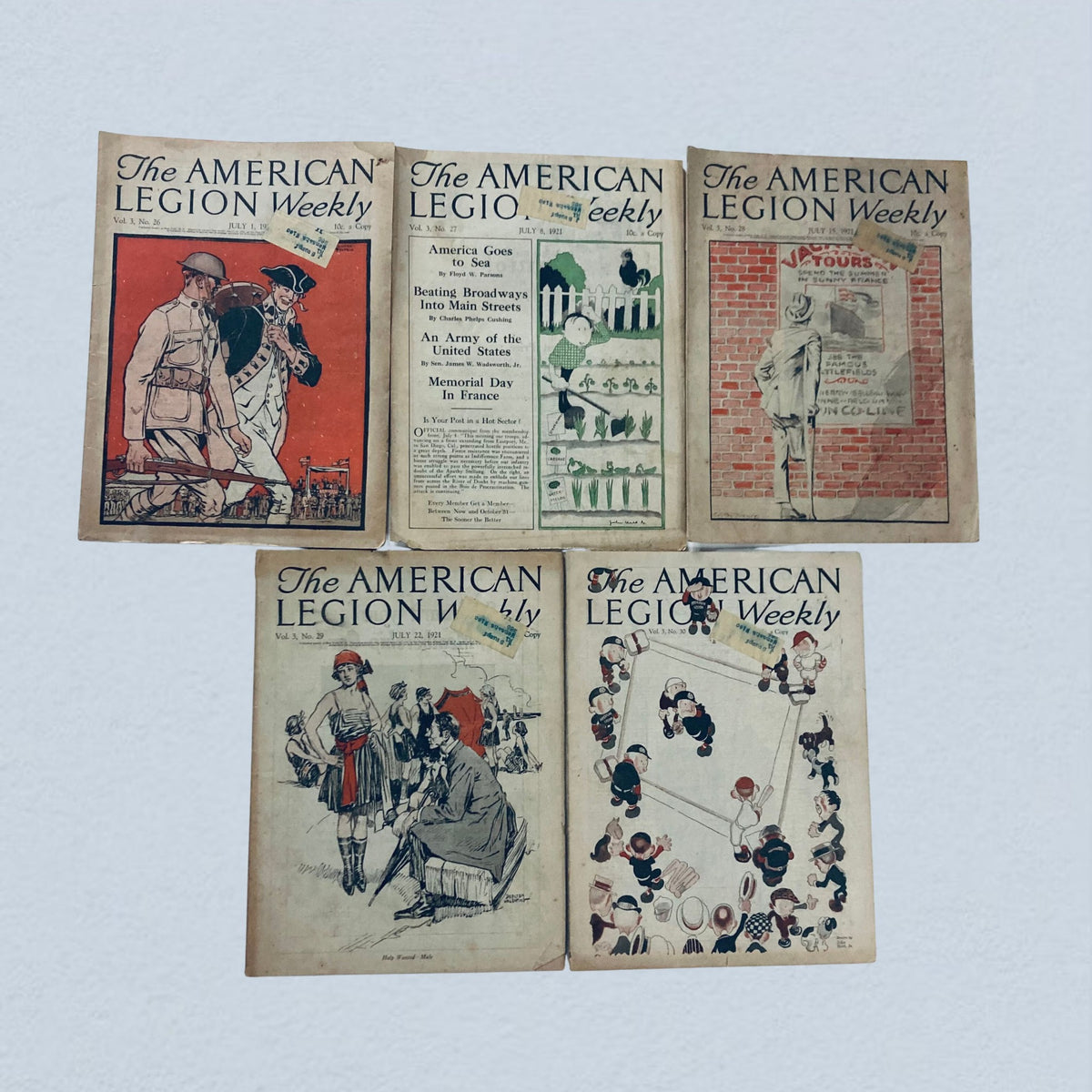 Lot of 40 VTG The American Legion Weekly Magazine featuring various covers from 1921, showcasing historical American themes and illustrations.