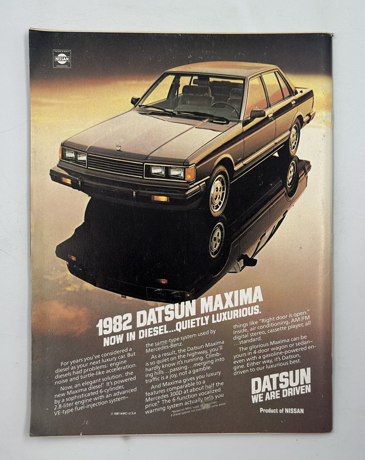 The New Yorker Magazine February 22, 1982 Top Hat Butterfly Rea Irvin Cover shown with a vintage 1982 Datsun Maxima automobile advertisement featuring the sedan and the slogan 'Now in Diesel...Quietly Maxima.'