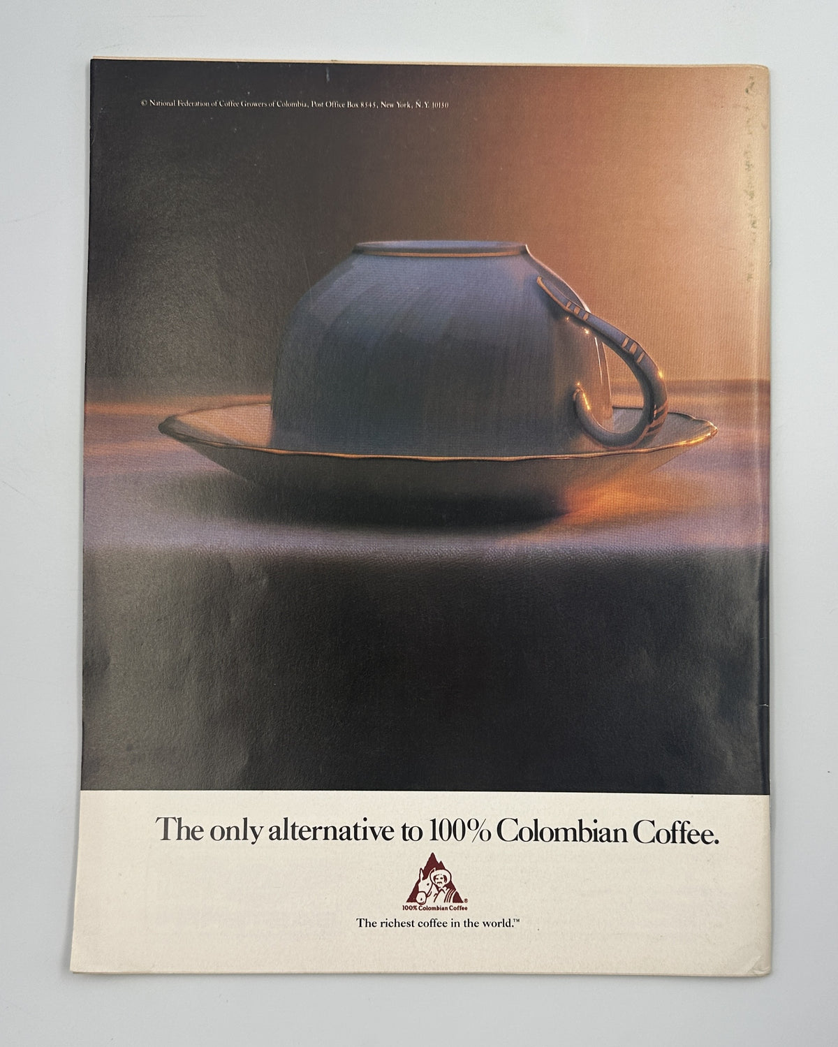 The New Yorker Magazine December 30, 1985 Cat Watching Parties Charles Addams Cover VG, interior advertisement featuring a dark hat and the slogan for 100% Colombian coffee.