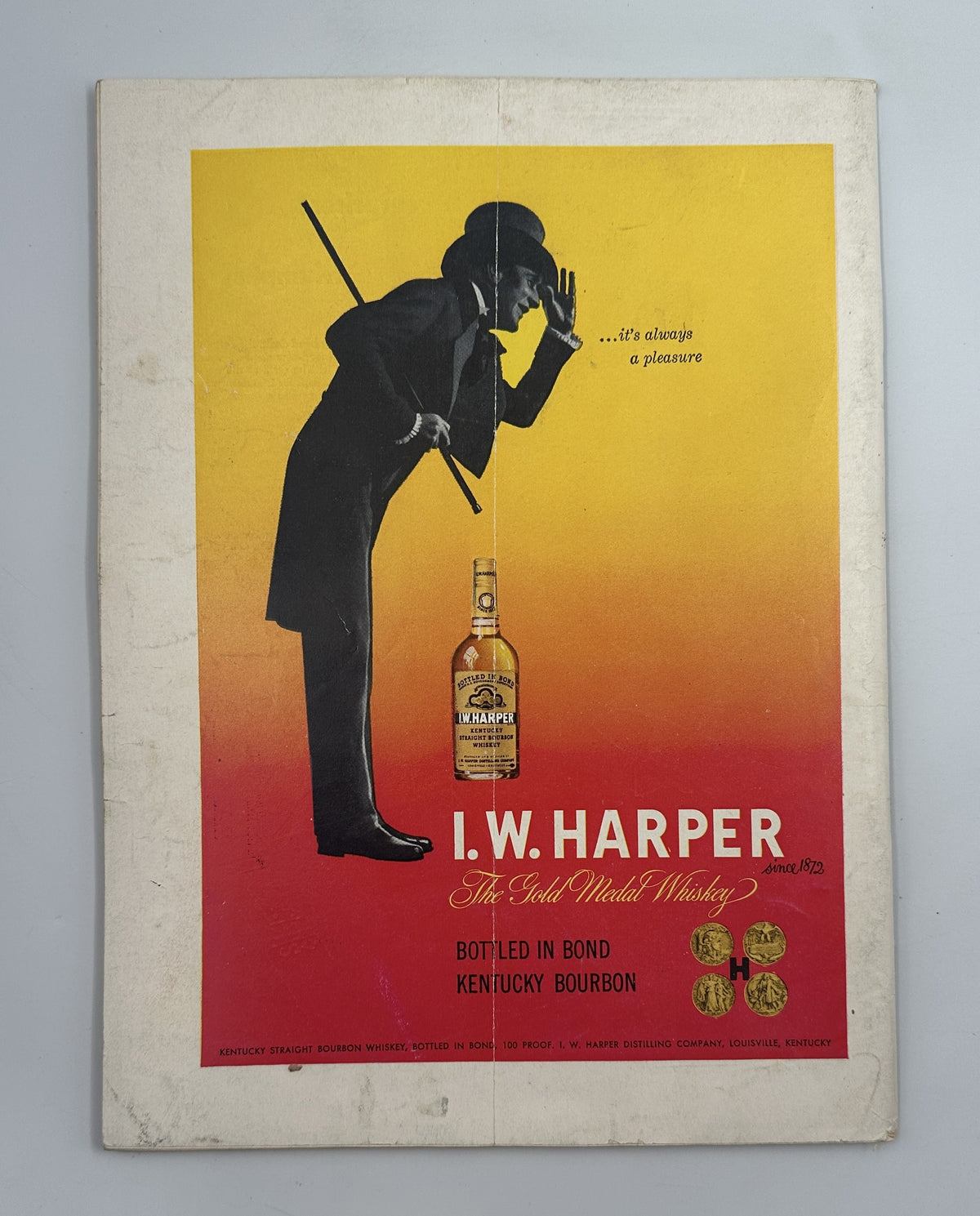 The New Yorker Magazine October 27, 1951 Football Locker Room Leonard Dove Cover, shown open to a vintage I.W. Harper Kentucky bourbon advertisement with a silhouetted figure.