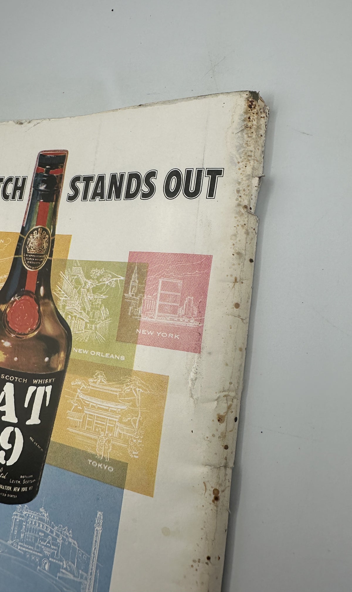 The New Yorker Magazine October 26, 1957 School Garrett Price Cover, close-up of the worn back cover edge and corner surrounding the Vat 69 advertisement.