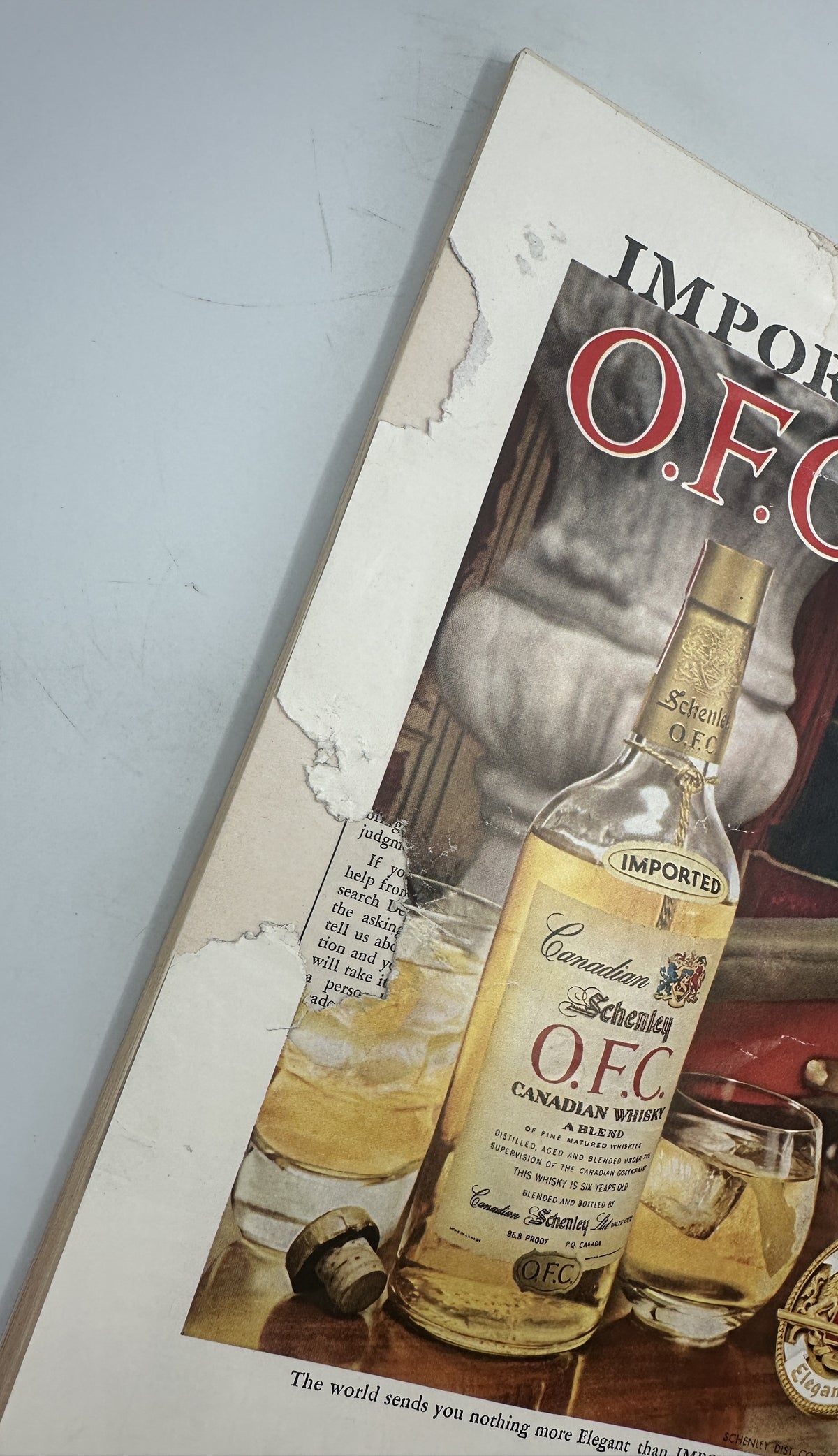 The New Yorker Magazine November 2, 1957 Halloween Abe Birnbaum Cover opened to a vintage imported O.F.C. Canadian whisky advertisement with a bottle and cocktail glasses.