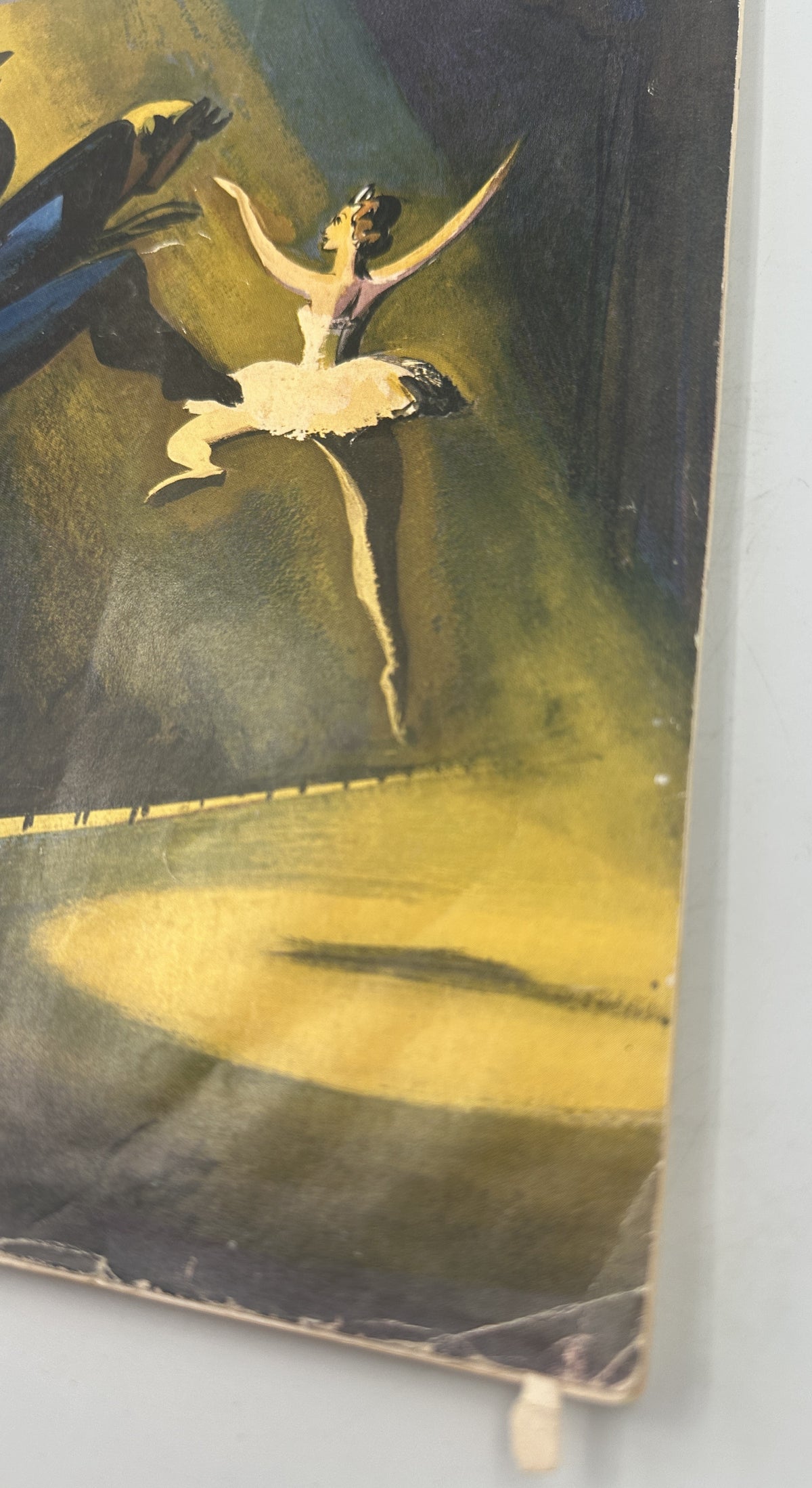 Close-up of the worn and water-damaged lower corner of The New Yorker Magazine November 3, 1951 Ballet Dancer Spotlight Arthur Getz Cover, showing the ballet illustration and visible edge wear.