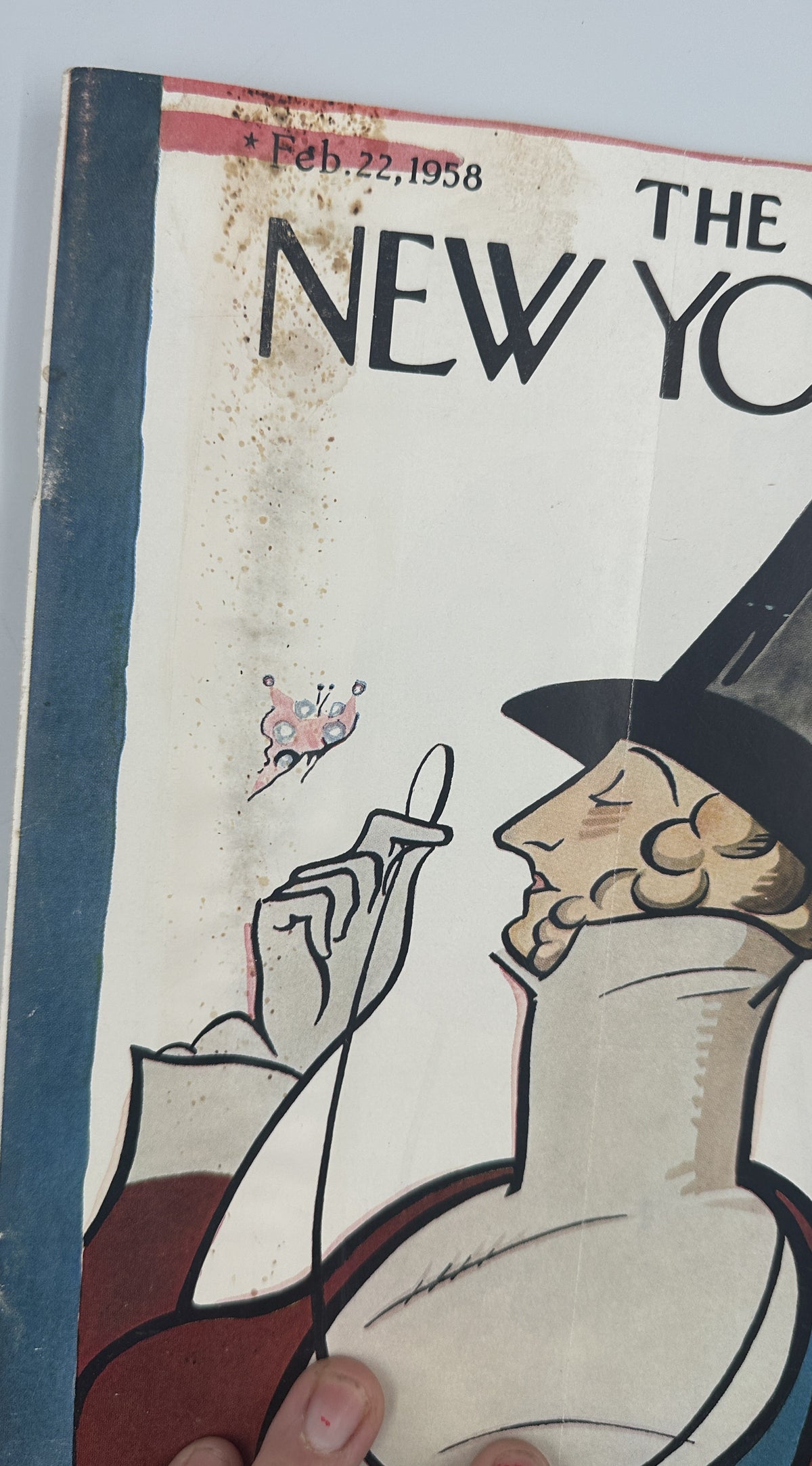 The New Yorker Magazine February 22, 1958 Top Hat Butterfly Rea Irvin Cover, close-up detail of the vintage cover illustration, date, masthead, butterfly, and visible discoloration and wear.