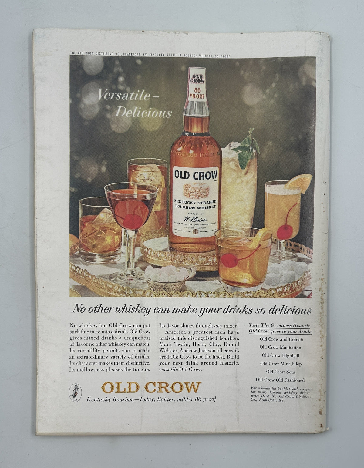 Full-page Old Crow bourbon whiskey advertisement featuring a bottle, assorted cocktails, cherries, ice, and the headline “Versatile—Delicious” in The New Yorker Magazine October 19, 1963 Man by Autumn Swimming Pool Charles D. Saxon Cover.