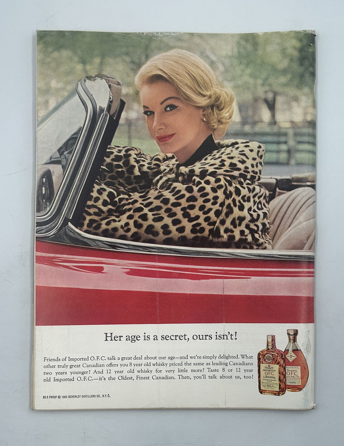 The New Yorker Magazine April 13, 1963 Modern Art Easter Eggs Charles Martin Cover, featuring a vintage advertisement with a woman in a leopard-print coat seated in a red convertible.
