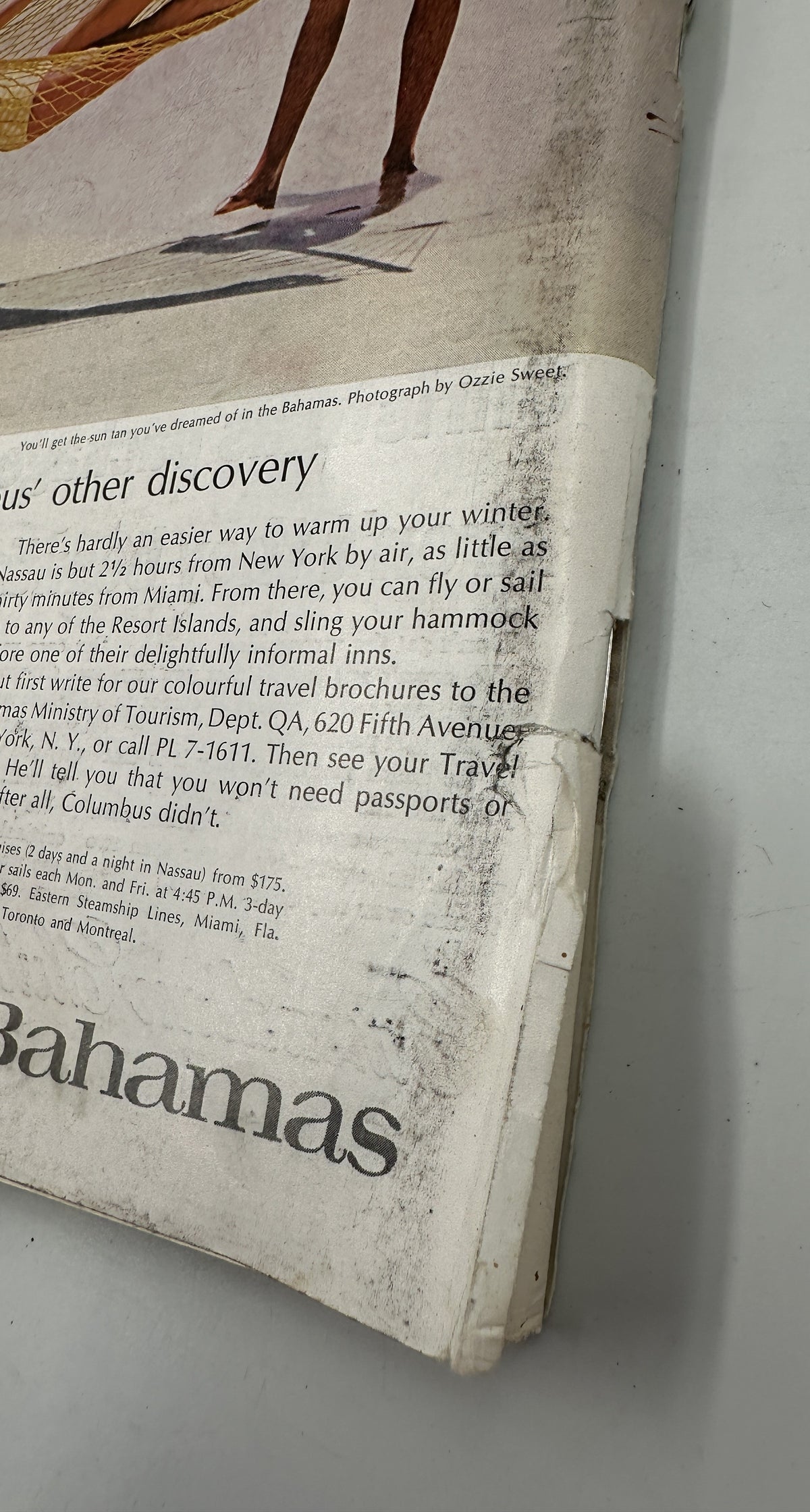 The New Yorker Magazine December 12, 1964 Beach Christmas Cards Charles D. Saxon Cover, close-up of the worn back cover featuring a Bahamas resort advertisement and Christopher Columbus text.