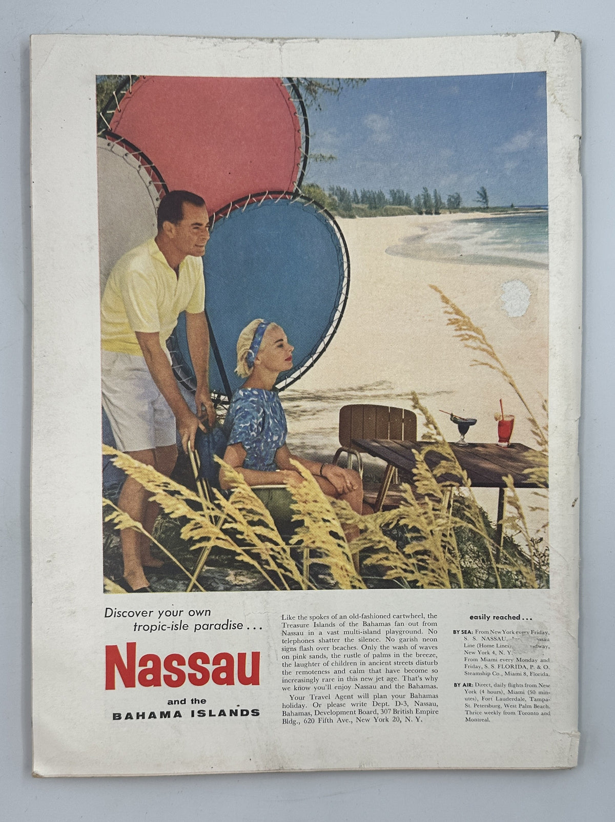 The New Yorker Magazine December 6, 1958 vintage Nassau, Bahamas travel advertisement featuring a couple relaxing on a tropical beach