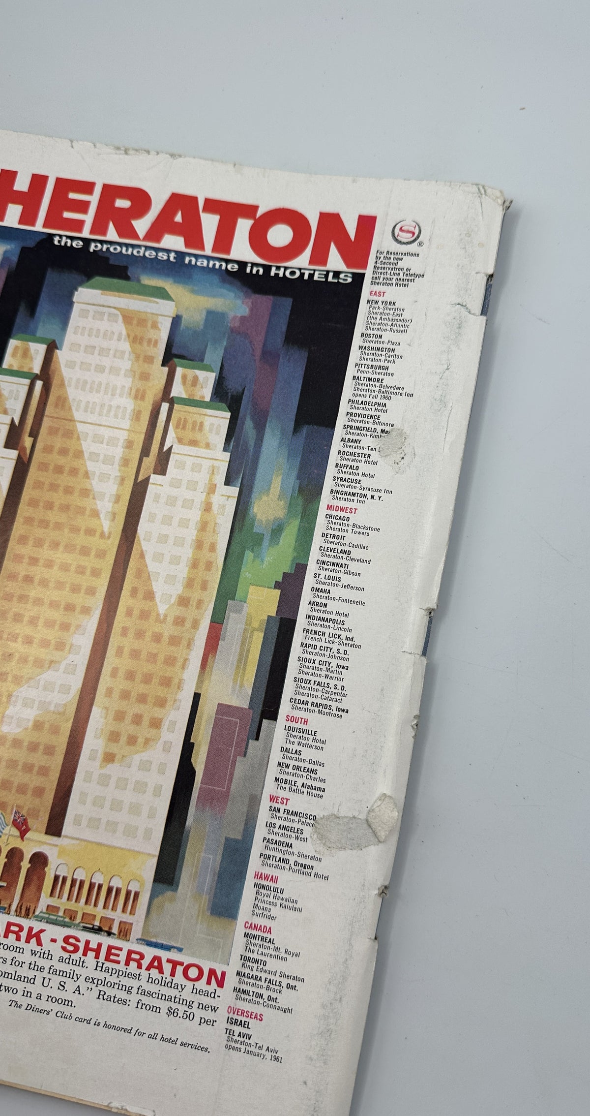 The New Yorker Magazine May 14, 1960 Nighttime City Street Spotlight Charles Martin Cover, interior Sheraton hotel advertisement featuring a colorful city skyline