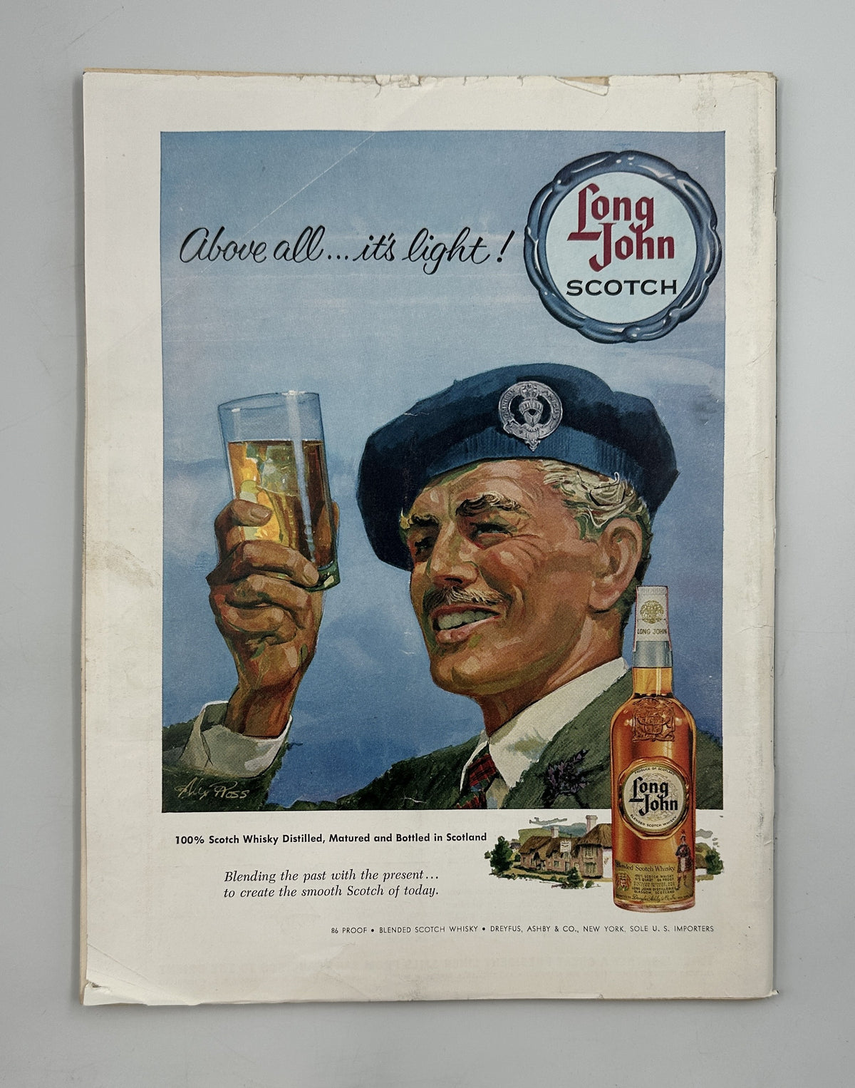 The New Yorker Magazine February 20, 1960 Tilley Butterfly Rea Irvin Cover, showing a vintage Long John Scotch whiskey advertisement featuring a smiling sailor holding a glass.