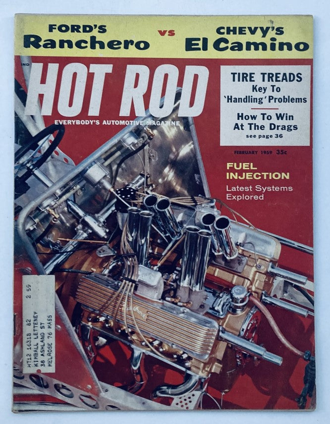 Front cover of VTG Hot Rod Magazine February 1959, showcasing the iconic debate of Ford Ranchero vs Chevy El Camino, featuring vibrant automotive imagery and headlines on tire treads and fuel injection.