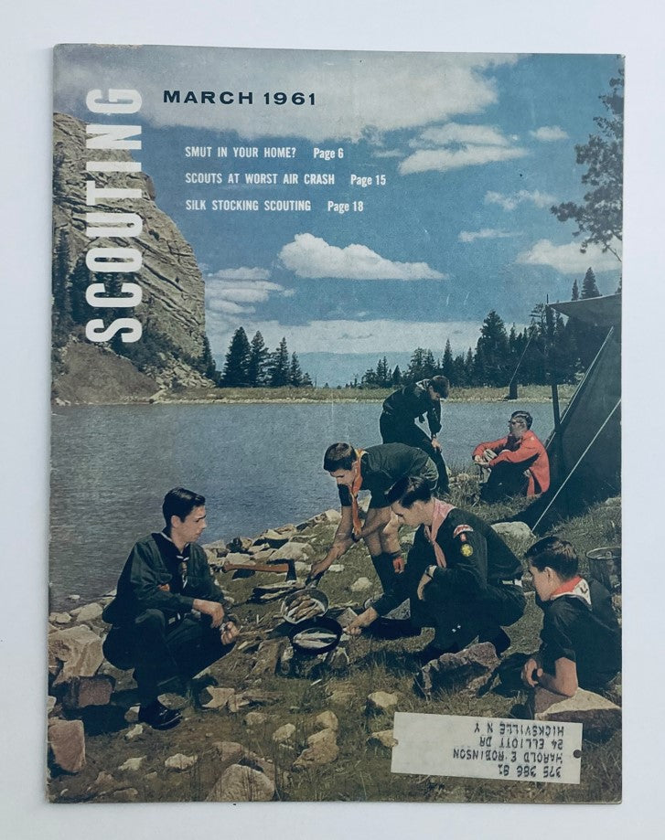 Cover of VTG Scouting Magazine from March 1961, Volume 49, Number 3, featuring young scouts engaged in outdoor activities near a lake, with the headlines 'Smut in Your Home?', 'Scouts at Worst Air Crash', and 'Silk Stocking Scouting'.