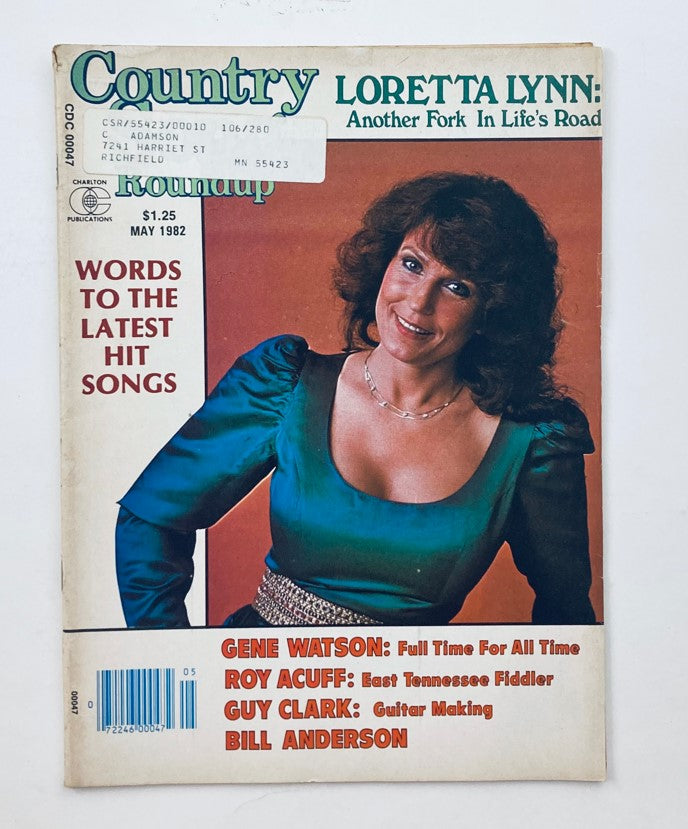 Front cover of the May 1982 issue of Country Song Roundup magazine featuring Loretta Lynn and Gene Watson. The cover includes highlights such as 'Loretta Lynn: Another Fork In Life's Road' and 'Words to the Latest Hit Songs', showcasing the vibrant country music scene of the era.