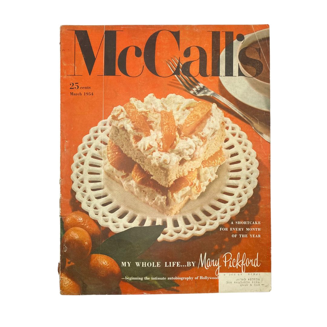 Cover of VTG McCall's Magazine March 1954 featuring a shortcake for every month of the year, showcasing a delicious layered dessert with whipped cream and citrus garnishes.