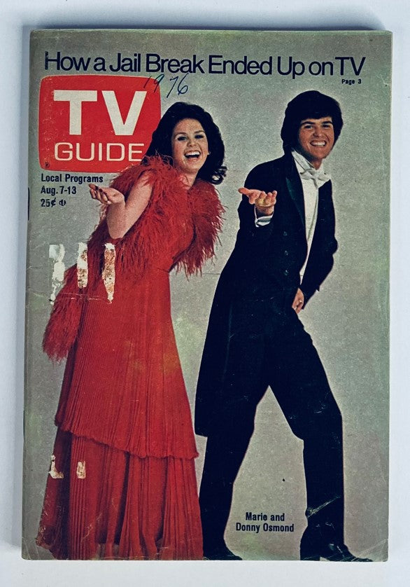 TV Guide Magazine August 1976, issue #1219 featuring Marie and Donny Osmond on the cover, showcasing their signature style and vibrant outfits. The magazine cover includes the title 'How a Jail Break Ended Up on TV' and highlights local programs from August 7-13.
