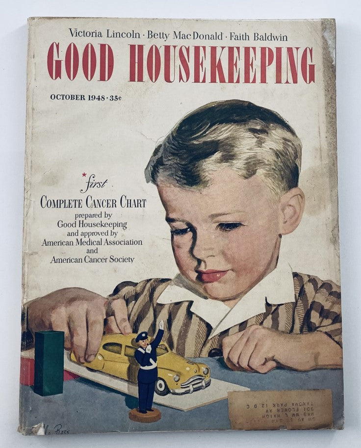Cover of VTG Good Housekeeping Magazine October 1948 featuring a young boy engaging with a toy car and a first complete cancer chart, highlighting its historical significance in women's health.