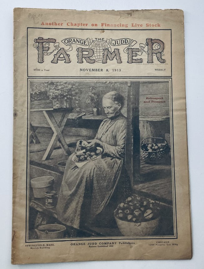 Cover of VTG Farmer Magazine from November 8, 1913, featuring a woman seated and sorting vegetables, showcasing early 20th-century agricultural life.