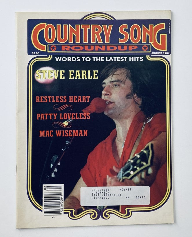 Cover of the VTG Country Song Roundup Magazine from August 1987 featuring Steve Earle, along with artists Restless Heart, Patty Loveless, and Mac Wiseman. The magazine showcases a snapshot of 1980s country music.