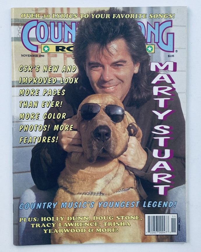 Cover of Country Song Roundup Magazine November 1993 featuring Marty Stuart with sunglasses and a dog, promoting exclusive content and interviews with country music stars.