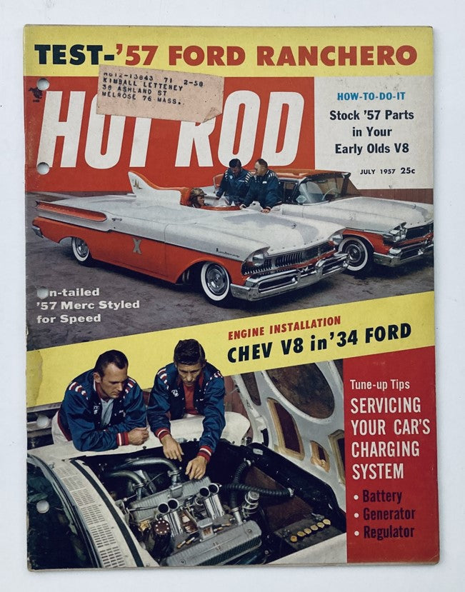 VTG Hot Rod Magazine July 1957 Vol 10 No. 7 cover featuring Chevrolet V8 engine installation in a 1934 Ford, with two men in automotive attire examining the engine, showcasing classic hot rod culture and vintage car enthusiasm.