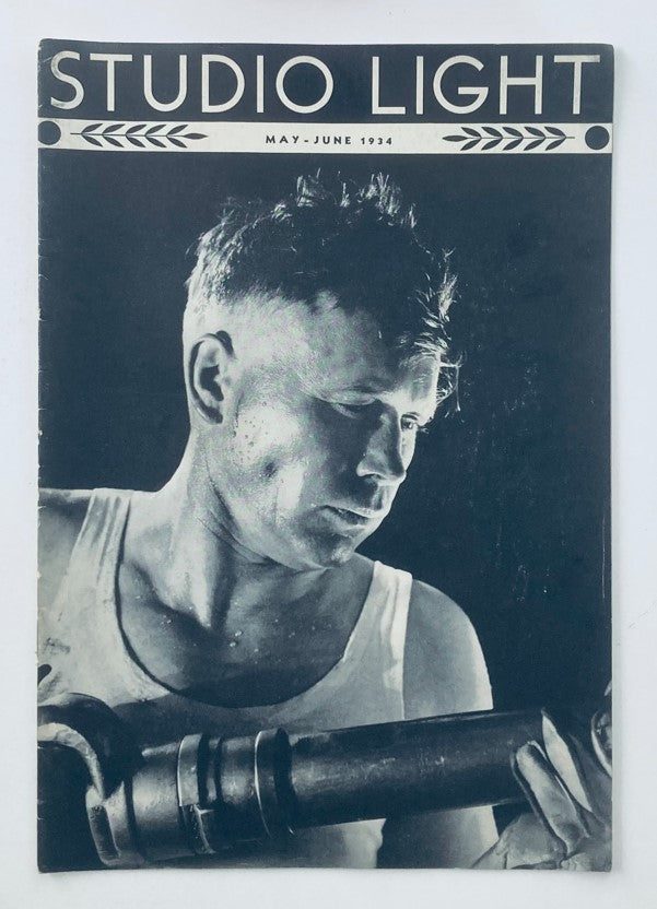 Cover of Studio Light Magazine May 1934 showcasing a vintage black and white portrait photograph of a male model in a tank top, highlighting the theme of portraiture.