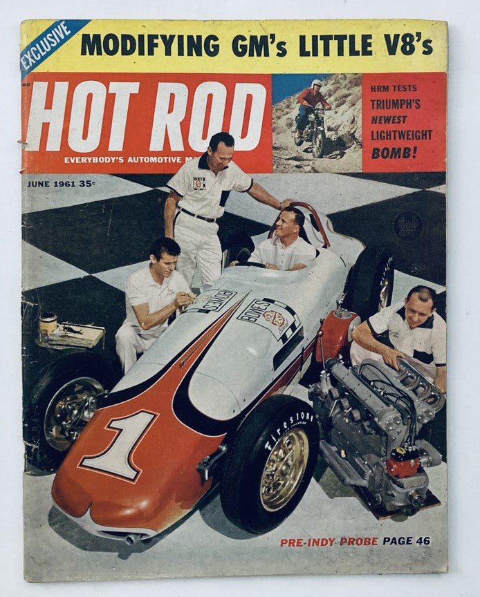 Cover of VTG Hot Rod Magazine, June 1961, Vol 14 No. 6, featuring a Group of men working on a race car, emphasizing the automotive culture and innovations of the era.