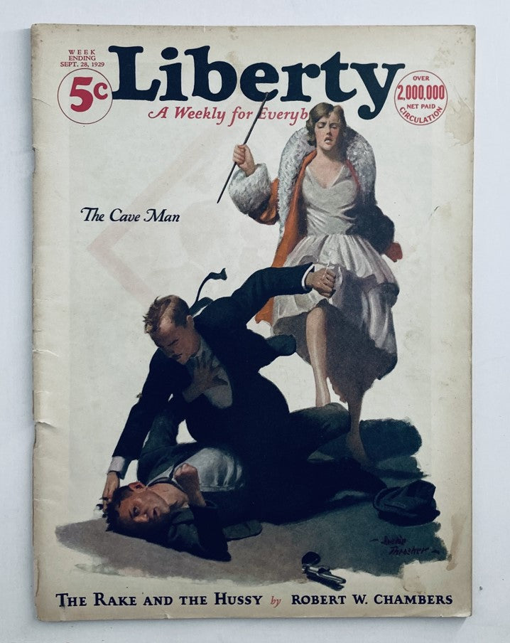 VTG Liberty Magazine from September 28, 1929, featuring 'The Cave Man' cover art, showcasing a dramatic scene with characters engaged in a struggle.