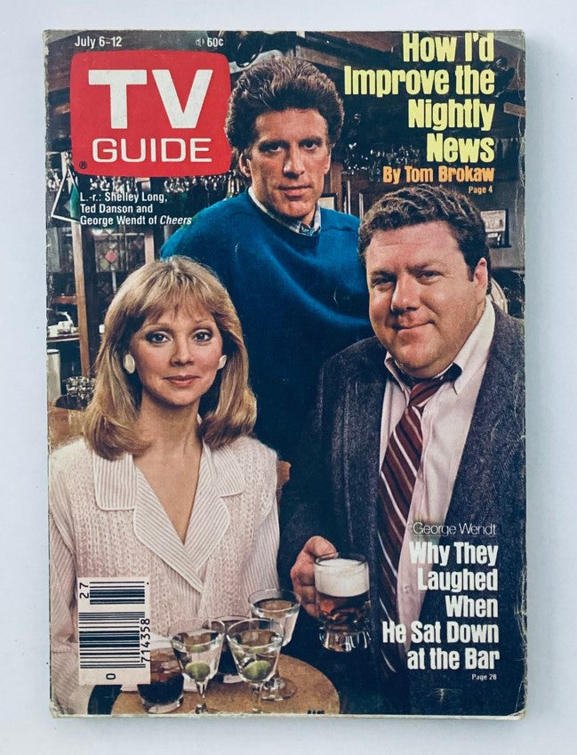 TV Guide Magazine featuring Shelley Long, Ted Danson, and George Wendt on the cover from July 6, 1985. The magazine headline discusses improving the nightly news, and showcases images of the actors from the show Cheers, emphasizing their nostalgic significance in television history.