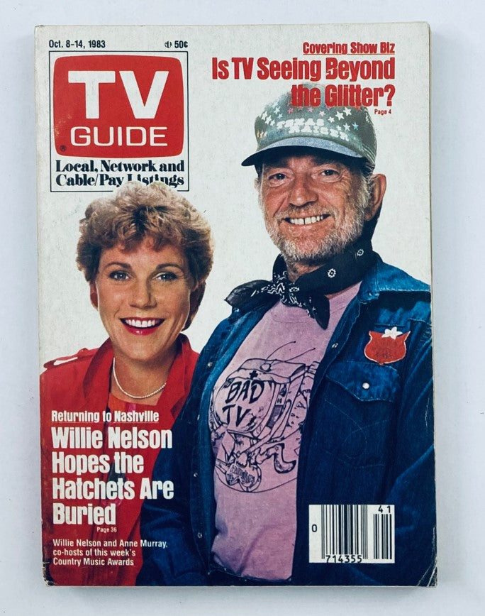 Cover of TV Guide Magazine from October 8, 1983, featuring Willie Nelson and Anne Murray. The magazine highlights television programming including the country music awards and displays the iconic TV Guide logo.