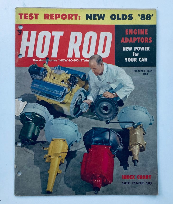 Cover of VTG Hot Rod Magazine February 1957 featuring engine adaptors for enhanced car power, showcasing a technician and various engine components.
